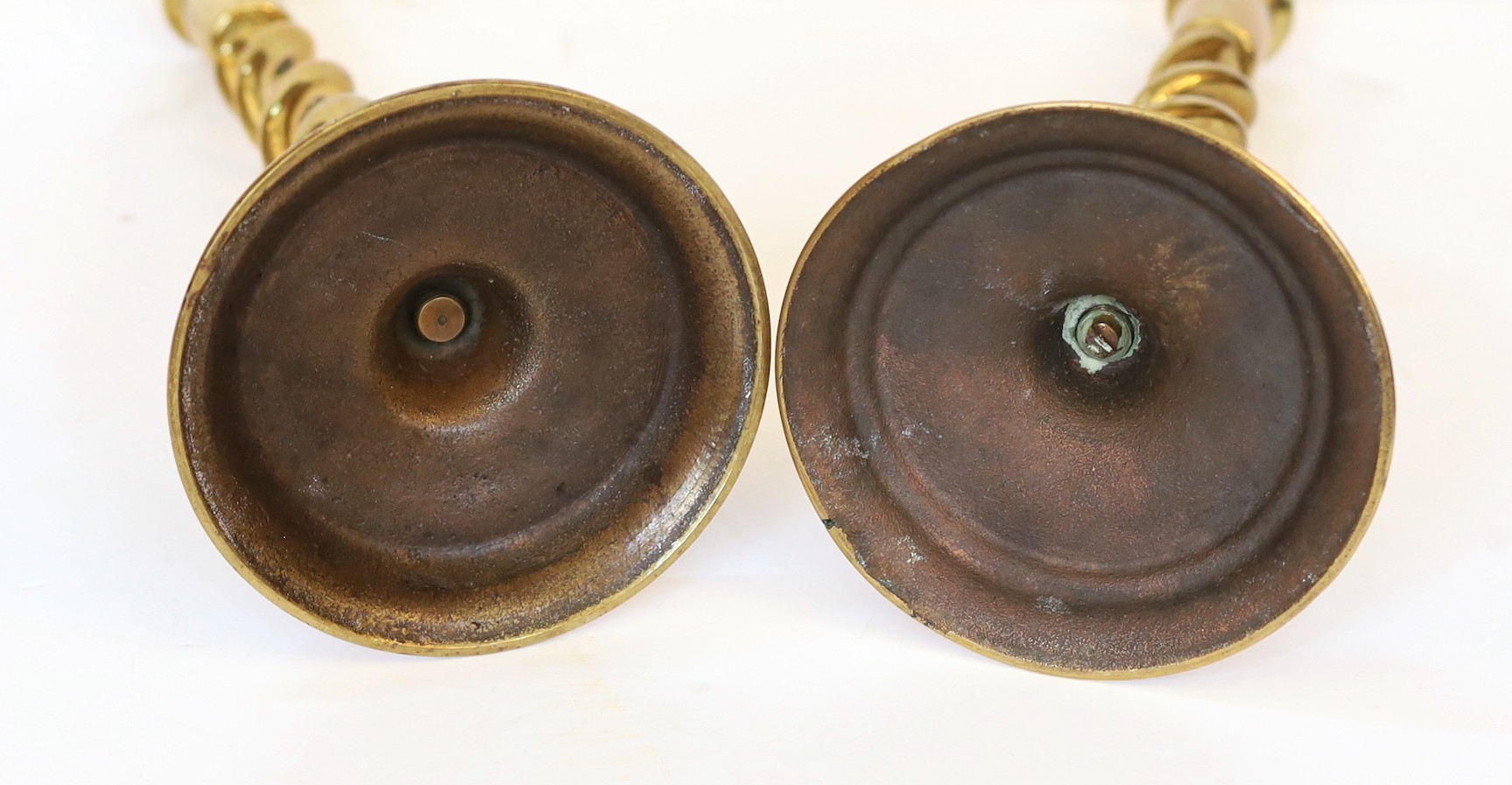 A pair of Victorian brass spiral twist candlesticks, height 30cm